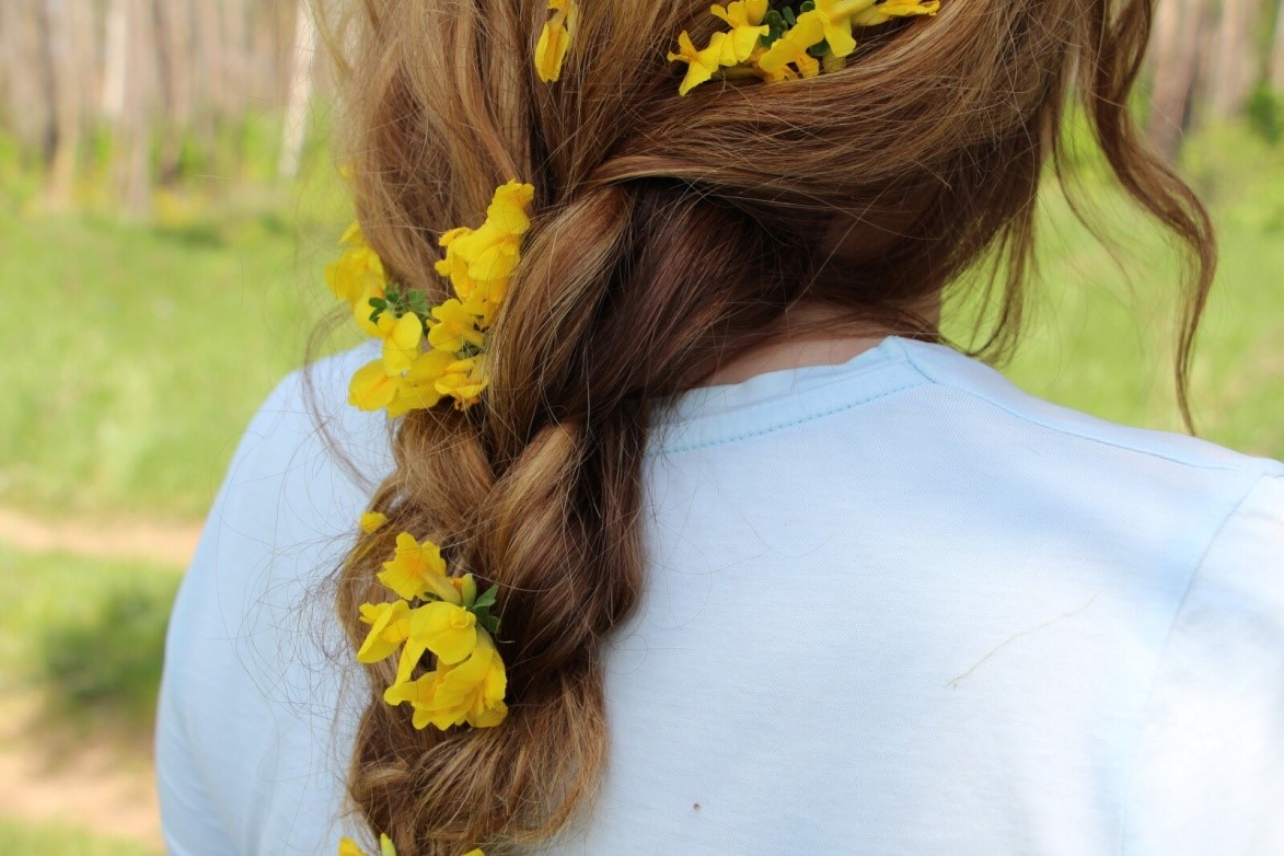 Curly hair with flowers